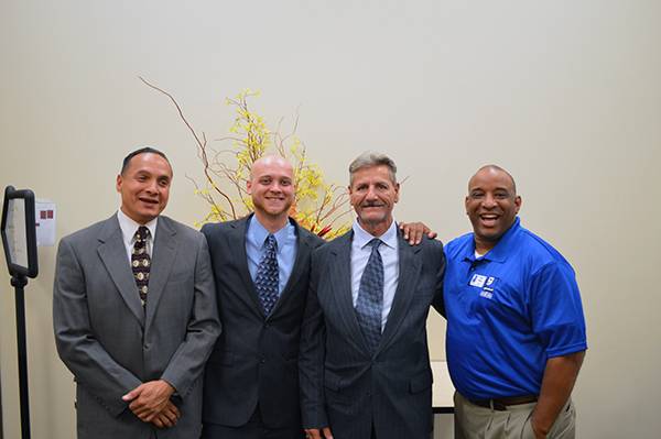 Ernest poses with members of the CEiR program on their graduation day.